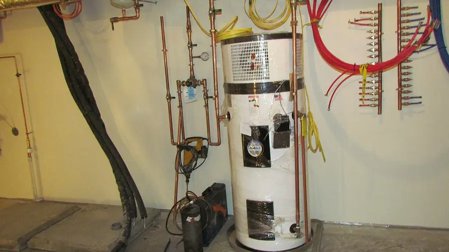 Tank water heaters with piping in a test lab