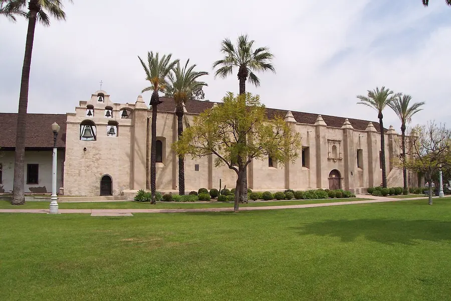 Mission San Gabriel church and bell wall in neighboring San Gabriel