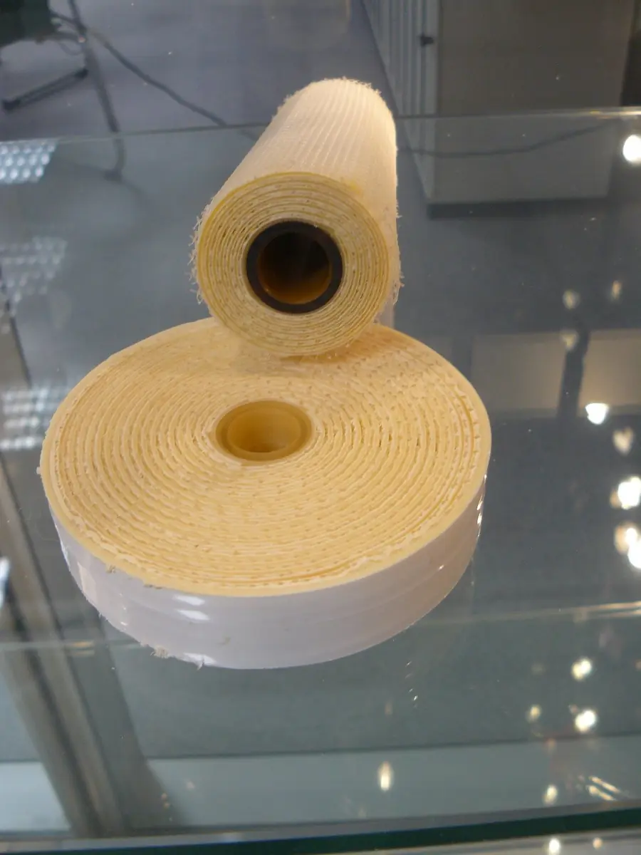Rolled reverse osmosis membrane module standing on a glass shelf