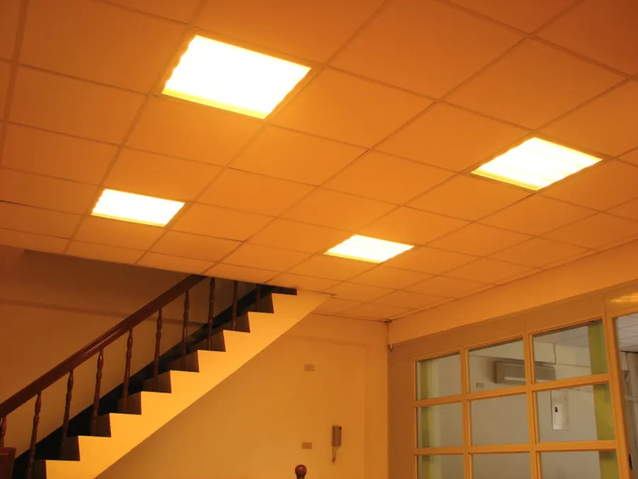 Square LED ceiling panels in a stairwell ceiling