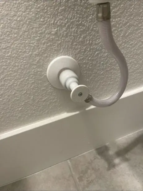 Toilet shutoff valve and braided supply line at the wall